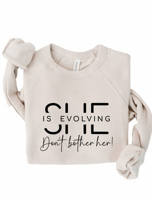 She is Evolving Bella Premium Sweatshirt