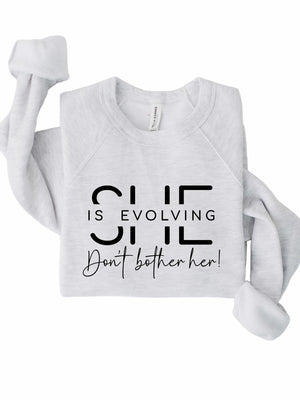 She is Evolving Bella Premium Sweatshirt