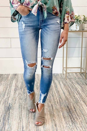 FADED MID HIGH RISE DISTRESSED JEANS