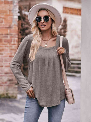 Double Take Pleated Detail Curved Hem Long Sleeve Top